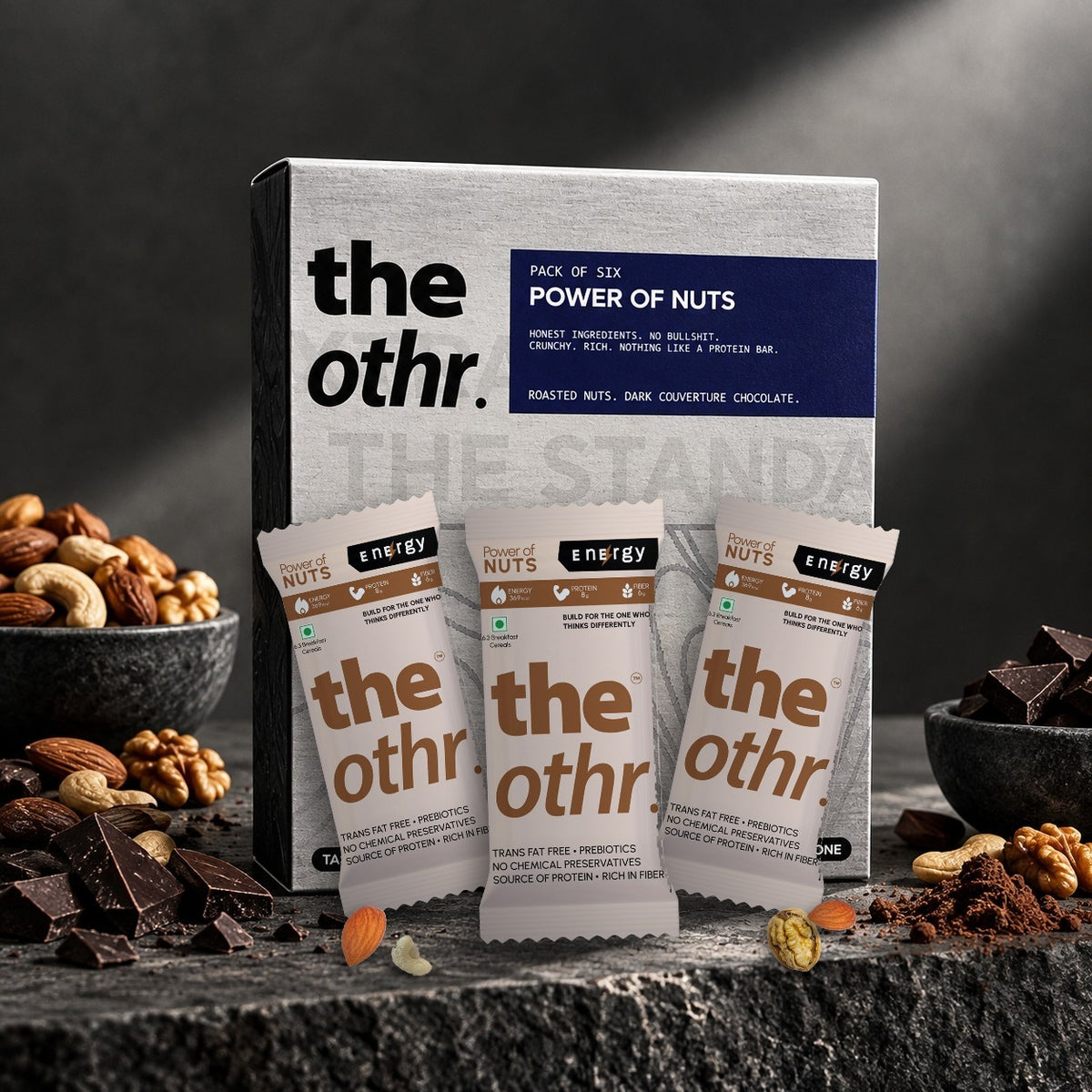 the othr. Power of Nuts pack of six box with three Power of Nuts bars